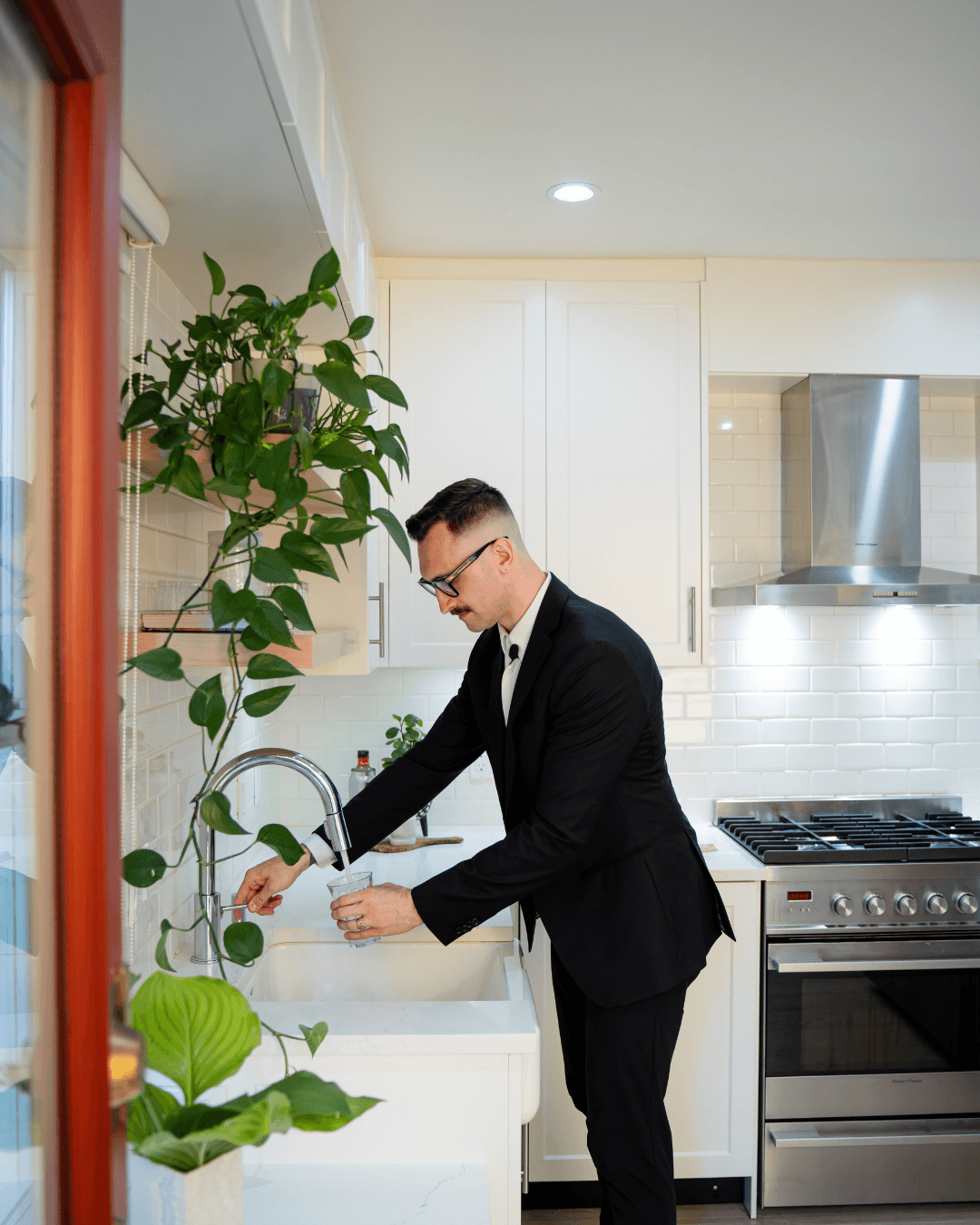 Kyle inspecting a luxury kitchen