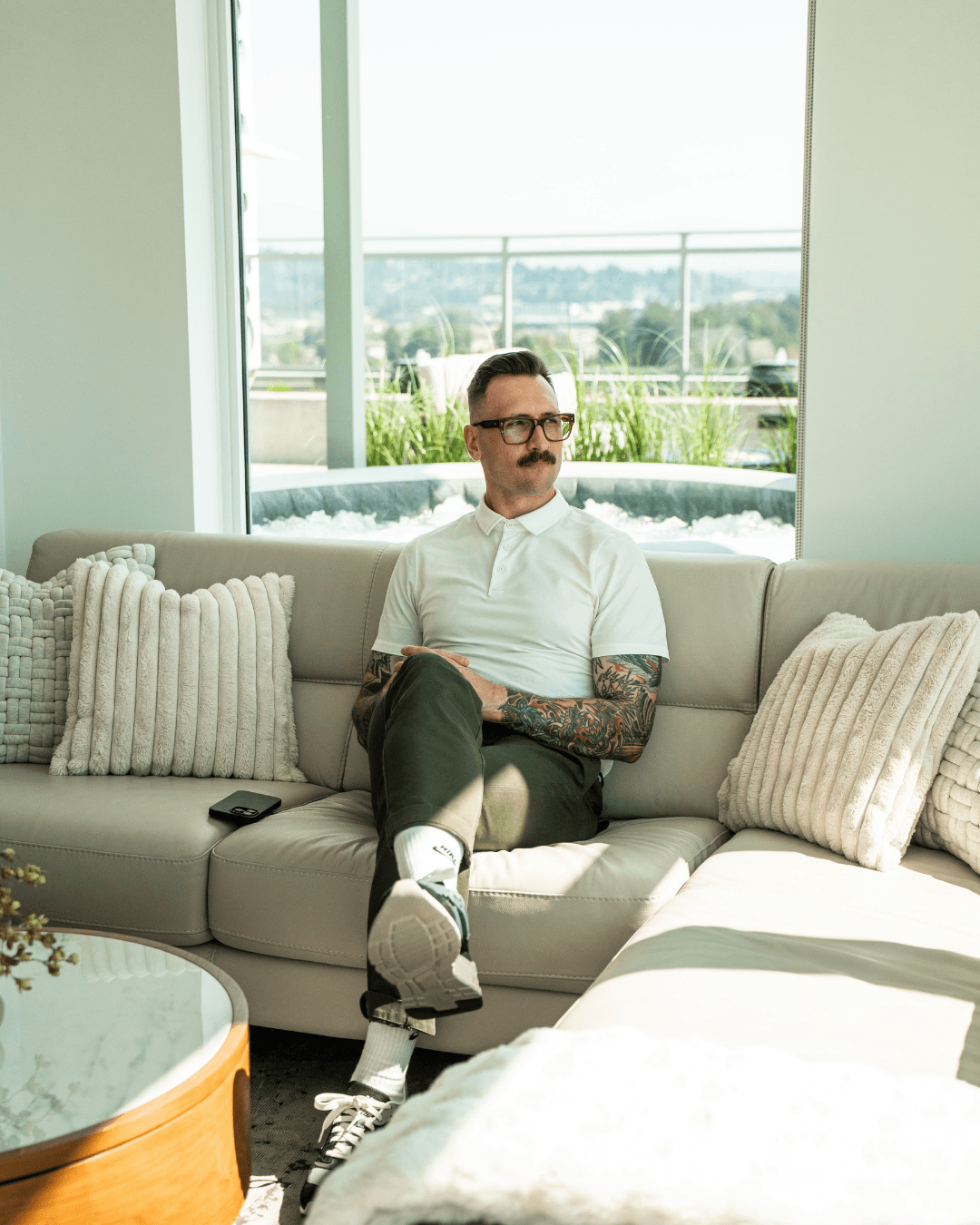 Kyle in luxury living room discussing financing